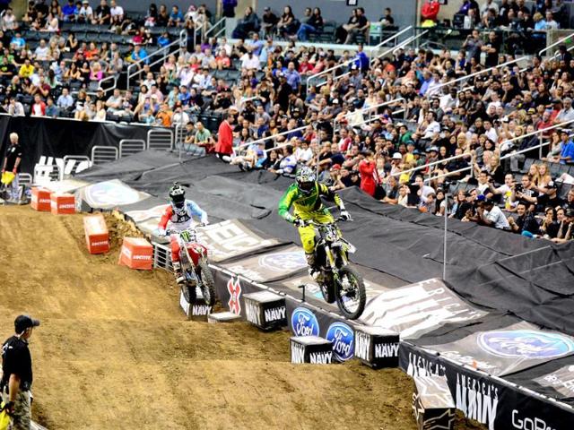 Blake Williams (R) led for much of the race but Nate Adams (L) won n the Moto X Speed and Style Gold medal at the X Games in Los Angeles, California. (AFP Photo)