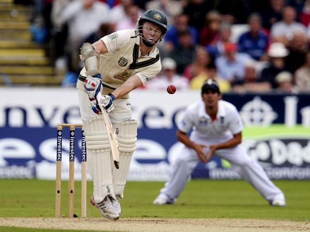 Australia's Chris Rogers is hit by a ball from England's James Anderson during the fourth Ashes Test cricket at the Riverside cricket ground in Chester-Le-Street, England . (Reuters Photo)