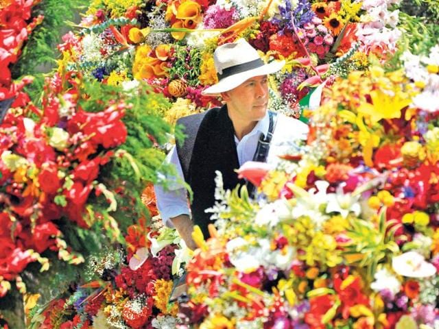 A flower grower, known as a silletero, looks at flower arrangements as he participates in the annual flower parade in Medellin. Reuters photo A flower grower, known as a silletero, looks at flower arrangements as he participates in the annual flower parade in Medellin. Reuters photo