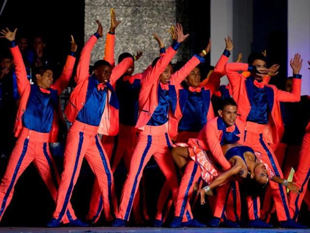 Members of Colombia's Juventud Salsera Dance School participate in the VIII World Salsa Festival at the Cañaveralejo bullring in Cali. (AFP Photo)