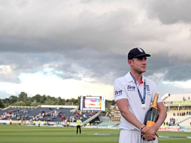 England's Stuart Broad holds his man of the match bottle of champagne after England won the fourth Ashes Testat the Durham cricket ground in Durham, England. (AFP Photo)