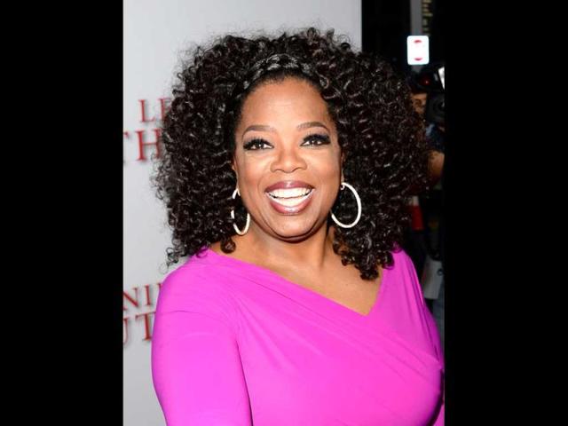 Oprah Winfrey arrives at the premiere of The Weinstein Company's "Lee Daniels' The Butler" at Regal Cinemas LA Live in Los Angeles, California. (AFP Photo)
