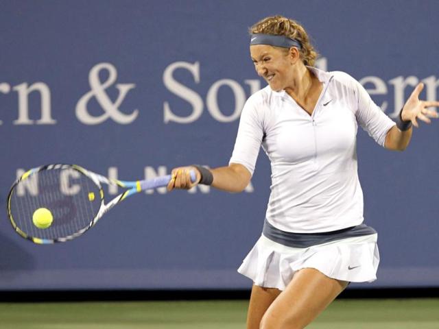 Victoria Azarenka of Belarus hits a return ball to Caroline Wozniacki of Denmark during their quarter final round match at the Women's Cincinnati Open tennis tournament in Cincinnati, Ohio. (Reuters Photo)