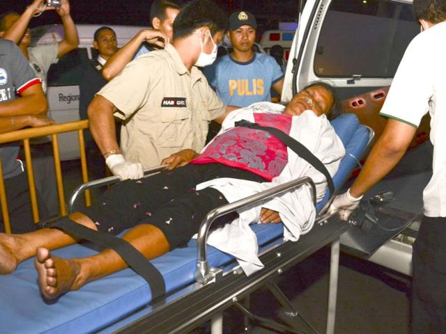 A survivor on a stretcher arrives at hospital in Cebu. (AFP Photo)