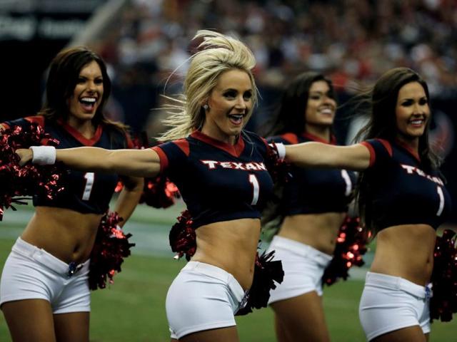 A group of Houston Texans cheerleaders perform in the second half of the preseason game against the Miami Dolphins at Reliant Stadium in Houston, Texas. (AFP Photo)