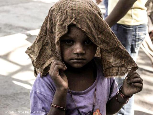 A kid on the street. (Photo: Moulin Oza)