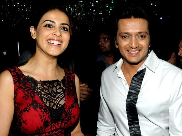 Ritesh Deshmukh and his wife Genelia D'Souza attend the 50th birthday bash of film actress Sridevi in Mumbai on August 17, 2013. (AFP Photo)