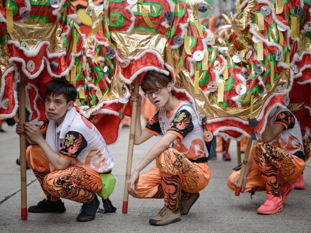 The Hungry Ghost festival marks the belief that the 'Gates of Hell' are opened to let out the hungry ghosts who then wander in the land of the living while foraging for food. (AFP Photo)