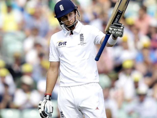 England's Joe Root celebrates his 50 during play on the third day of the fifth Ashes Test at The Oval in London. (AP Photo)
