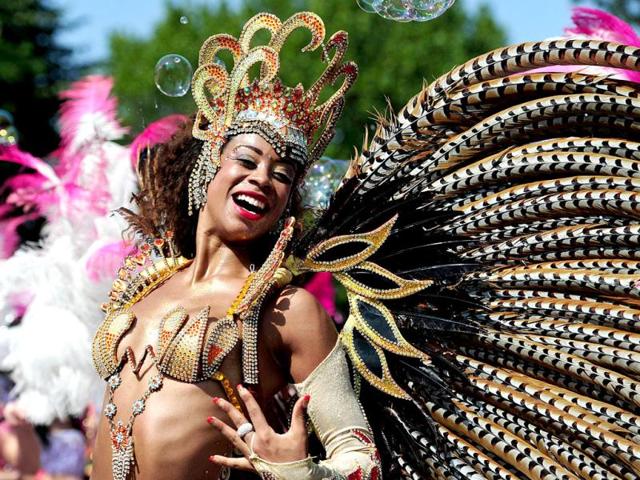 A performer takes part in the parade on the second day of the Notting Hill Carnival in London. (AFP Photo)