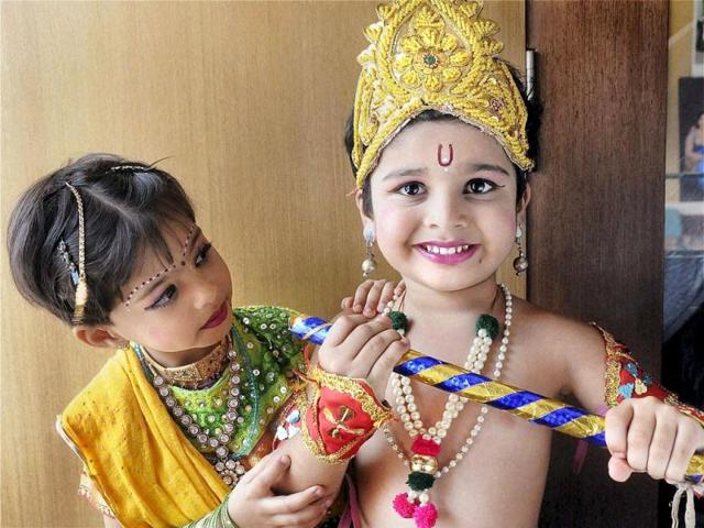 Two children dressed up as Krishna and Radha on the occasion of Janmashtami festival in Hubli, Karnataka. PTI Photo