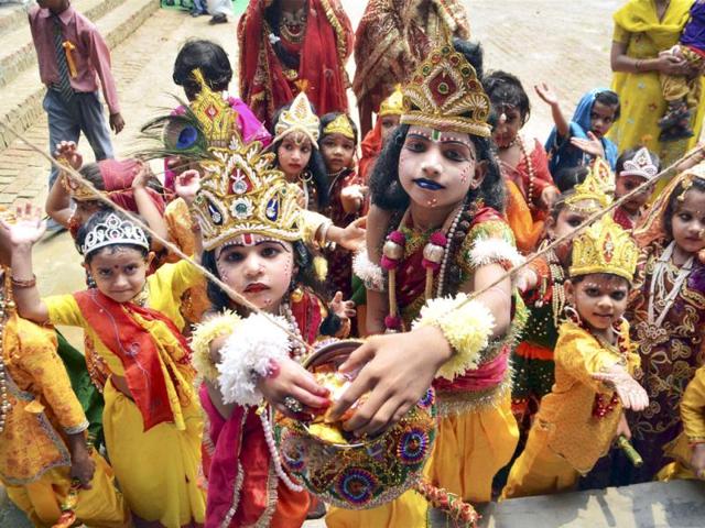 Children dressed as Krishna and Radha as part of a fancy dress competition organised by a school on Krishna Janmastami in Moradabad. PTI Photo