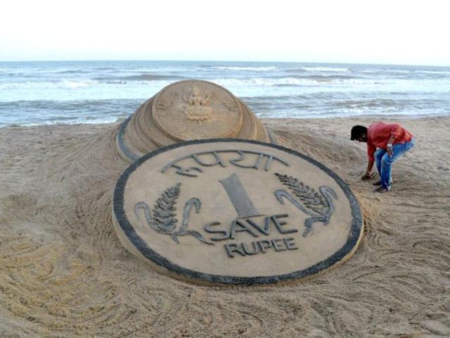 Rupee at record low