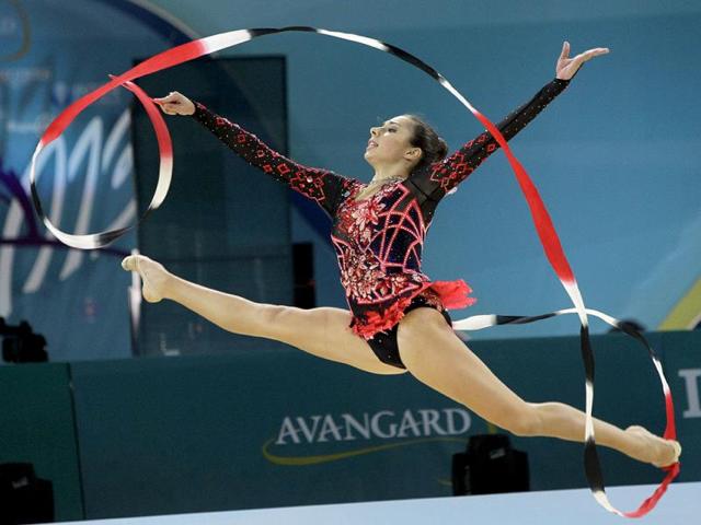 Rebecca Sereda of USA perform with ribbon during the 32nd rhythmic gymnastics world championships in Kiev, Ukraine. AP Photo Rebecca Sereda of USA perform with ribbon during the 32nd rhythmic gymnastics world championships in Kiev, Ukraine. AP Photo