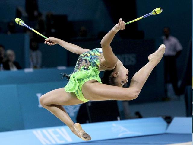 Margarita Mamun of Russia perform with clubs during the 32nd rhythmic gymnastics world championships in Kiev, Ukraine. AP Photo Margarita Mamun of Russia perform with clubs during the 32nd rhythmic gymnastics world championships in Kiev, Ukraine. AP Photo