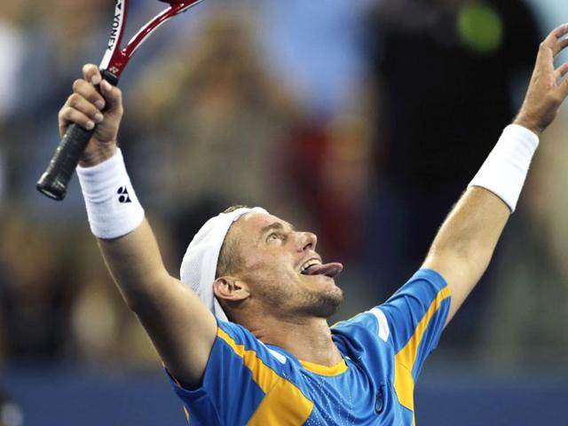 Lleyton Hewitt reacts after defeating Juan Martin del Potro in the second round of the US Open tennis tournament in New York. (AP Photo)