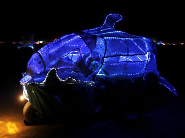 An art car drives across at the 2013 Burning Man arts and music festival in the Black Rock desert of Nevada. (Reuters Photo)