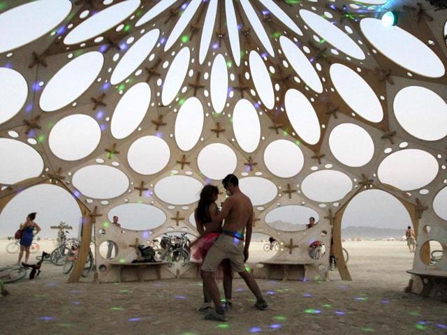 Participants dance in a dance dome during the "Gold Bikini Happy Hour" at the Burning Man arts and music festival in Nevada, US. (Reuters Photo)