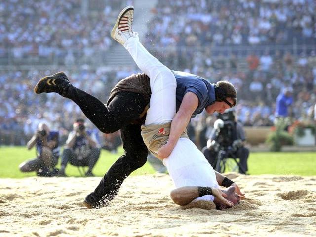 Wrestlers during the opening day of the Federal Alpine Wrestling Festival in Frauenfeld, Switzerland. (AFP Photo)