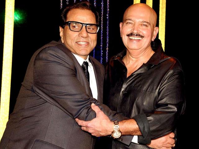 Dharamendra greets Rakesh Roshan on his 64th birthday. (AFP Photo)