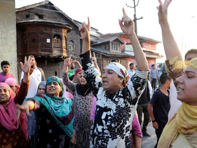 Kashmiri Muslims shout slogans during a protest against the Ehaas-e-Kashmir music concert in Srinagar. (AFP Photo)