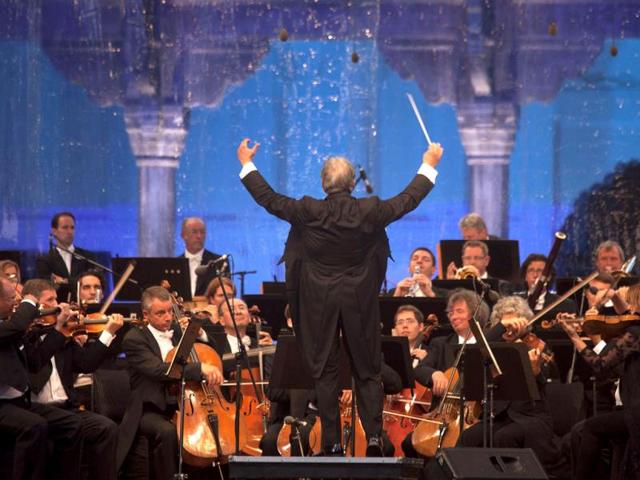 Orchestra conductor Zubin Mehta conducts the Bavarian State Orchestra, during the Ehsaas-e-Kashmir (Feelings for Kashmir) concert at Shalimar Garden on the outskirts of Srinagar. (AP Photo)