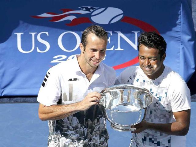 Leander Paes (R) and partner Radek Stepanek pose with their trophy after they defeated Alexander Peya of Austria and Bruno Soares of Brazil in their US Open men's doubles final match. (Reuters Photo) 