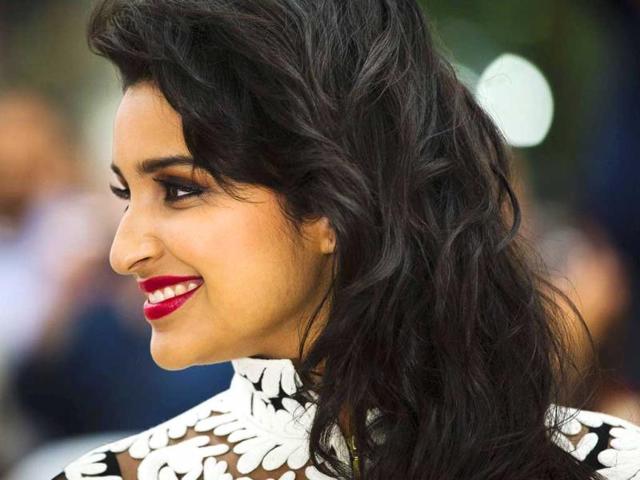 Parineeti Chopra smiles as she arrives for a screening of her film "A Random Desi Romance" at the 38th Toronto International Film Festival in Toronto. (Reuters Photo)