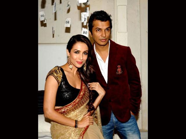 Indian Bollywood actress Malaika Arora Khan (L) and designer Vikram Phadnis pose for a photo during the announcement of The House of Style Preview to the Blenders Pride Fashion Tour 2013 in Mumbai on September 17, 2013. AFP PHOTO/ STR Indian Bollywood actress Malaika Arora Khan (L) and designer Vikram Phadnis pose for a photo during the announcement of The House of Style Preview to the Blenders Pride Fashion Tour 2013 in Mumbai on September 17, 2013. AFP PHOTO/ STR