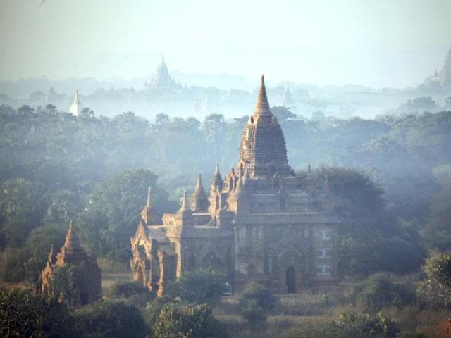 Ancient temples stand at sunrise in Bagan, central Myanmar. After closing its doors to the West for half a century, Myanmar has reopened, inviting all to come and discover its treasures, ancient palaces of kings long gone, legends and mysteries told in stone. Photo: AP/Khin Maung Win