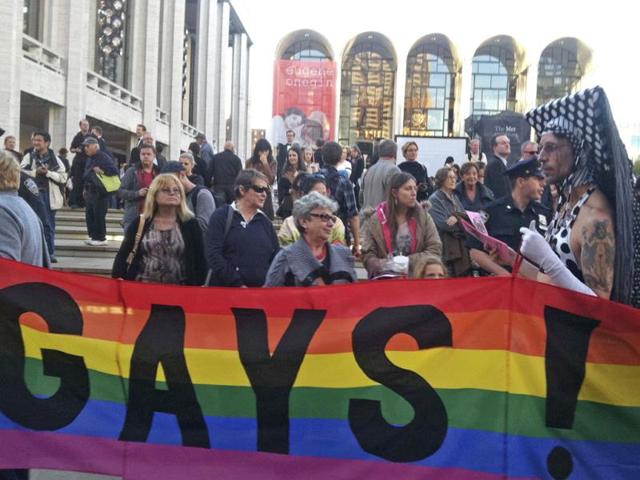 Anti-Putin protestors demonstrate in front of the Metropolitan Opera at Lincoln Center in New York. Putin has denied that homosexuals face discrimination in Russia and said the law does not infringe on their rights.(AP Photo)