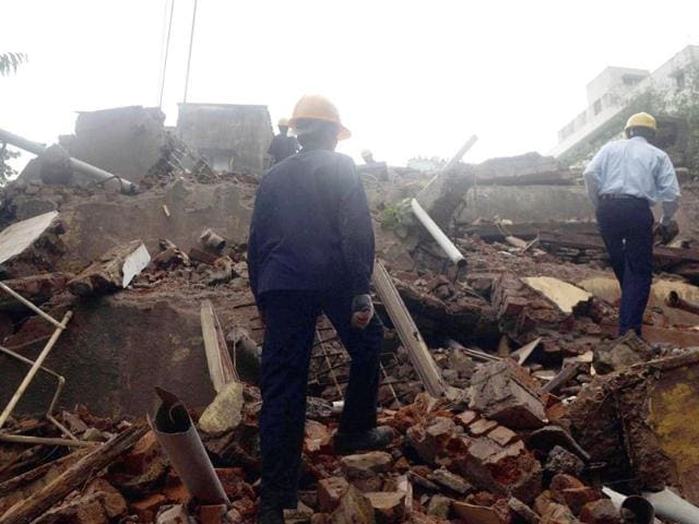 A five-storey building collapsed in Mumbai at day-break in the latest such incident in the city, with dozens feared trapped inside. (AFP Photo)