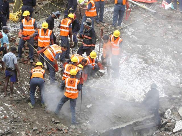 The five-storey apartment block collapsed on Friday in Mumbai, killing six people, with dozens feared trapped. (Reuters Photo)