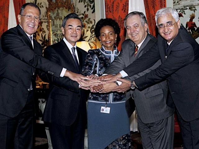 External affairs minister Salman Khurshid and his counterparts shake hands during a luncheon under the framework of the 68th session of the United Nations General Assembly, at the UN headquarters in New York. (PTI Photo)