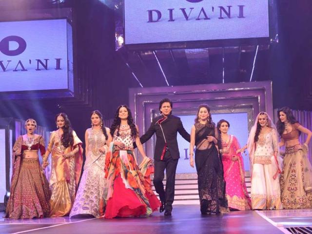 SRK walked the ramp with nine actresses - Rekha, Sridevi, Madhuri Dixit, Juhi Chawla, Rani Mukherjee, Preity Zinta, Katrina Kaif, Anushka Sharma and Parineeti Chopra at an event organised to pay tribute to Yash Chopra on his 81st birth anniversary. SRK walked the ramp with nine actresses - Rekha, Sridevi, Madhuri Dixit, Juhi Chawla, Rani Mukherjee, Preity Zinta, Katrina Kaif, Anushka Sharma and Parineeti Chopra at an event organised to pay tribute to Yash Chopra on his 81st birth anniversary.