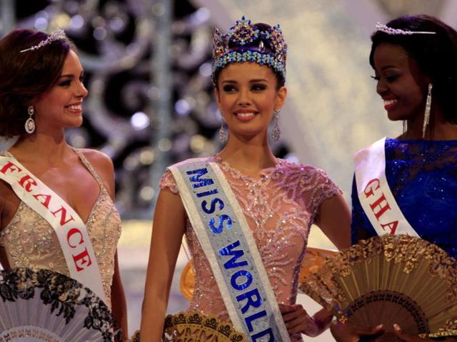 Newly crowned Miss World, Megan Young of Philippines (C) with second runner-up Miss France Marine Lorpheline (L) and third runner-up Miss Ghana Carranza Naa Okailey Shooter. (AP Photo)
