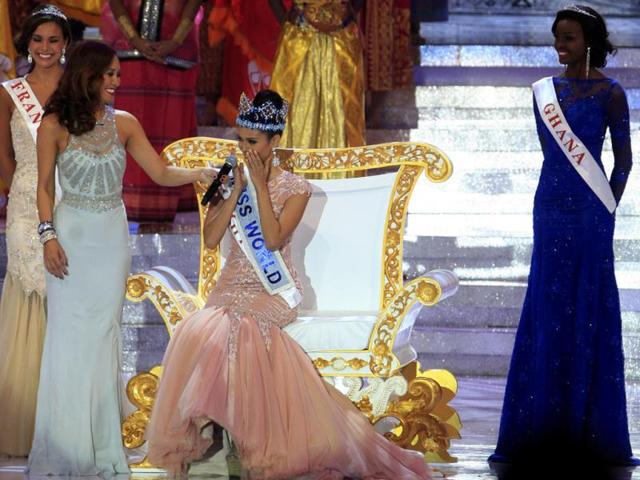 Newly crowned Miss World, Megan Young of the Philippines (C) reacts after winning the Miss World contest, in Nusa Dua, Bali, Indonesia. (AP Photo)