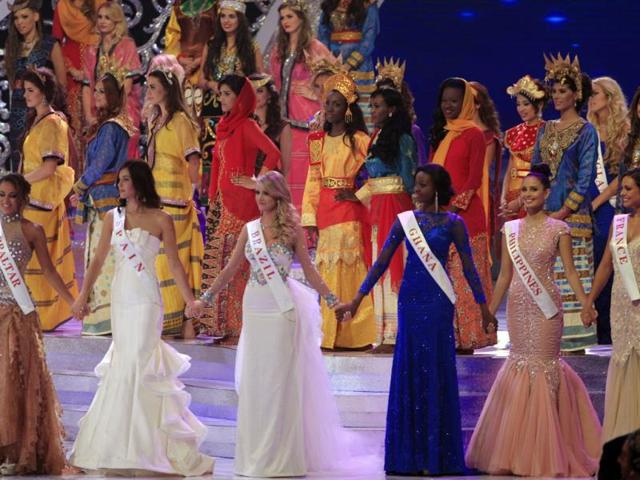 Contestants front (row from L), Miss Gibraltar Maroua Kharbouch, Miss Spain Elena Ibarbian Jimenez, Miss Brazil Sancler Frantz Konzen, Miss Ghana Carranza Naa Okailey Shooter, Miss Philippines Megan Young and Miss France Marine Lorpheline during the grand final of Miss World 2013 pageant. (AP Photo)