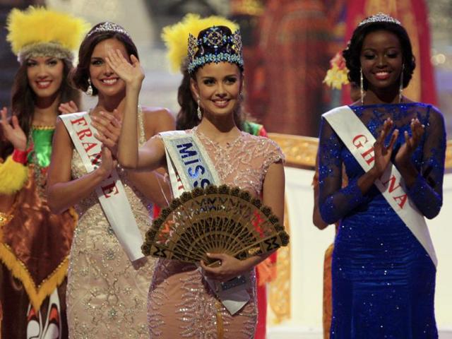 Newly crowned Miss World Megan Young of Philippine (C) waves, after winning the Miss World contest, in Nusa Dua, Bali. (AP Photo)