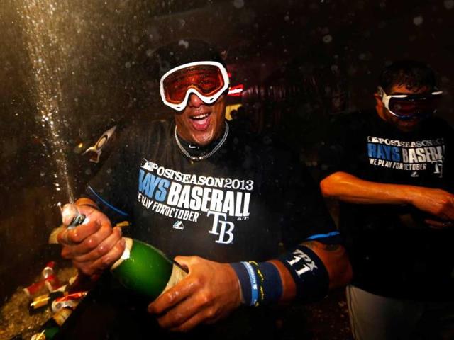 Yunel Escobar #11 of the Tampa Bay Rays celebrates their 5 to 2 win over the Texas Rangers in Arlington, Texas. (AFP Photo)
