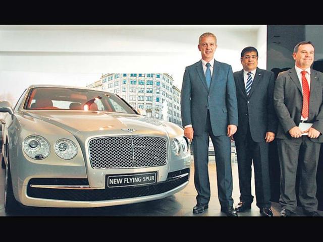 Regional-manager-India-Chris-Buxton-R-and-MD-Exclusive-Motors-Satya-Bagla-L-pose-with-Bentley-s-Flying-Spur-in-New-Delhi-on-Monday-Photo-Jasjeet-Plaha-HT Regional-manager-India-Chris-Buxton-R-and-MD-Exclusive-Motors-Satya-Bagla-L-pose-with-Bentley-s-Flying-Spur-in-New-Delhi-on-Monday-Photo-Jasjeet-Plaha-HT