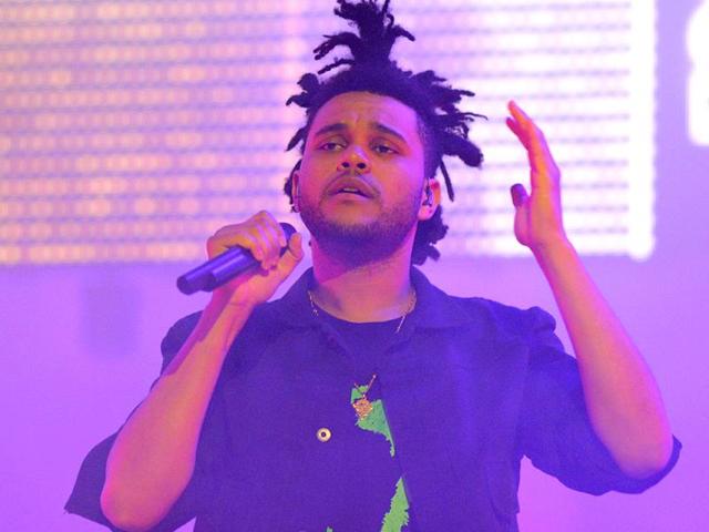 Canadian recording artist Abel Tesfaye performs at the Radio City Music Hall in New York. (AP Photo)