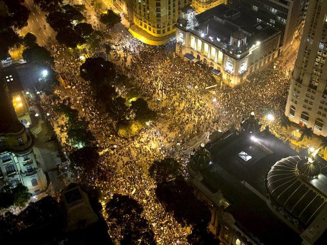 People pack the Cinelandia square in Rio de Janeiro, Brazil. (AP Photo)