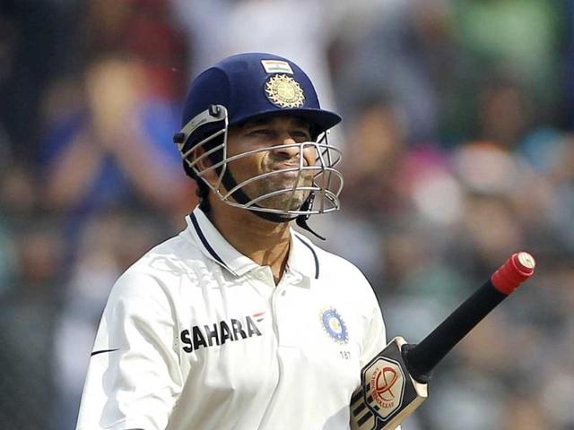 Sachin Tendulkar leaves the field after his dismissal by West Indian player Ravi Rampaul, in Mumbai in 2011. (AP Photo)