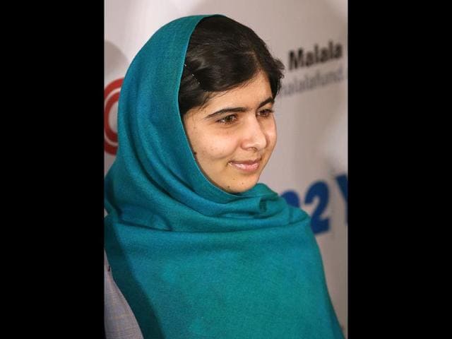 Malala-Yousafzai-speaks-during-a-media-conference-at-the-Library-of-Birmingham-in-Birmingham-England-after-she-was-named-as-winner-of-The-Nobel-Peace-Prize-AP-Photo