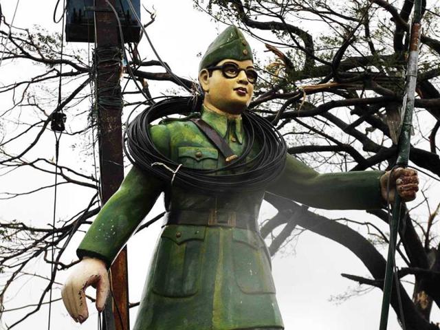 Electric wires entangled around the statue of Subhash Chandra Bose at road crossing post Cyclone Phailin in Berhampur. (AP Photo)