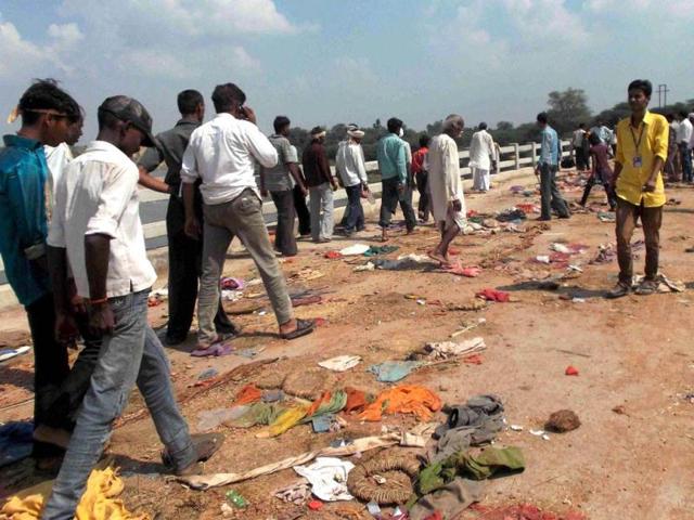 A scene after a stampede at the Sindhu River bridge through which pilgrims were heading towards the Ratangarh temple in Datia district of Madhya Pradesh on Sunday morning. (PTI Photo)