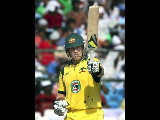Aaron Finch celebrates his fifty during their 2nd ODI match against India at Sawai Man Singh Stadium in Jaipur. (PTI Photo)