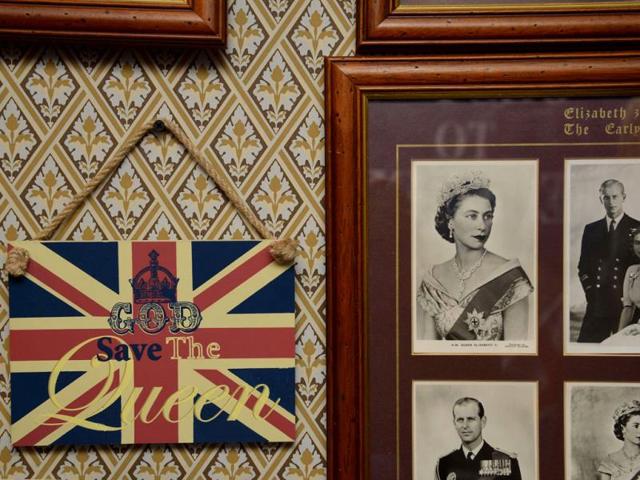 Photographs and a royal declaration, seen at the house of Margaret Tyler who has dedicated her house as a shrine to the British royal family. (Reuters Photo)