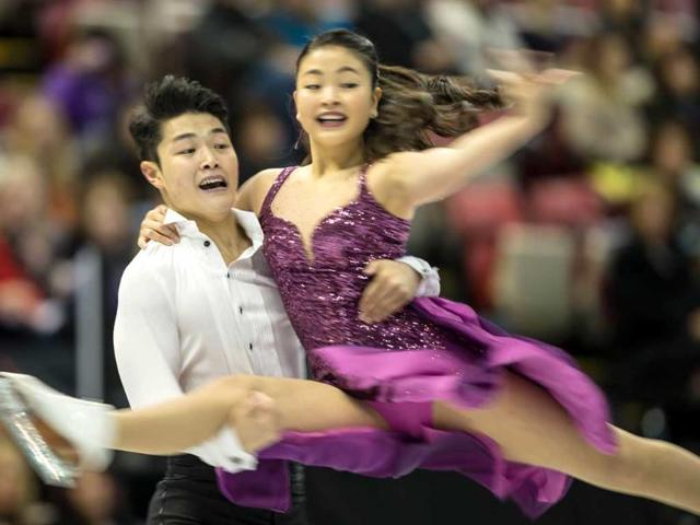 Ice dancers Maia Shibutani and Alex Shibutani of the United States skate their short program at Skate America 2013. (AFP Photo)